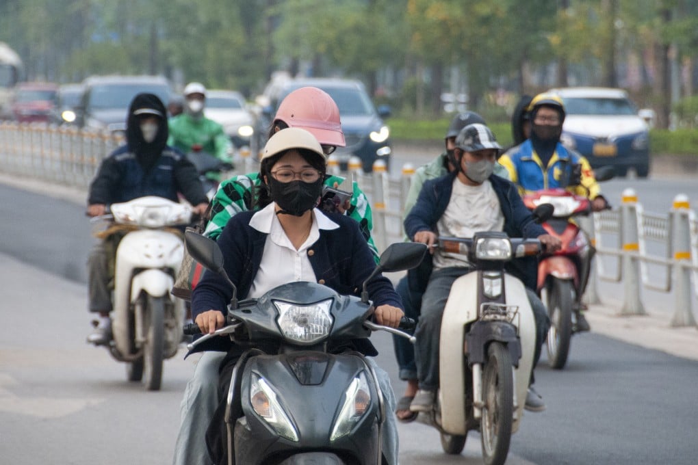 People wearing face masks due to poor air quality in Hanoi, Vietnam, on December 4 last year. Photo: Xinhua