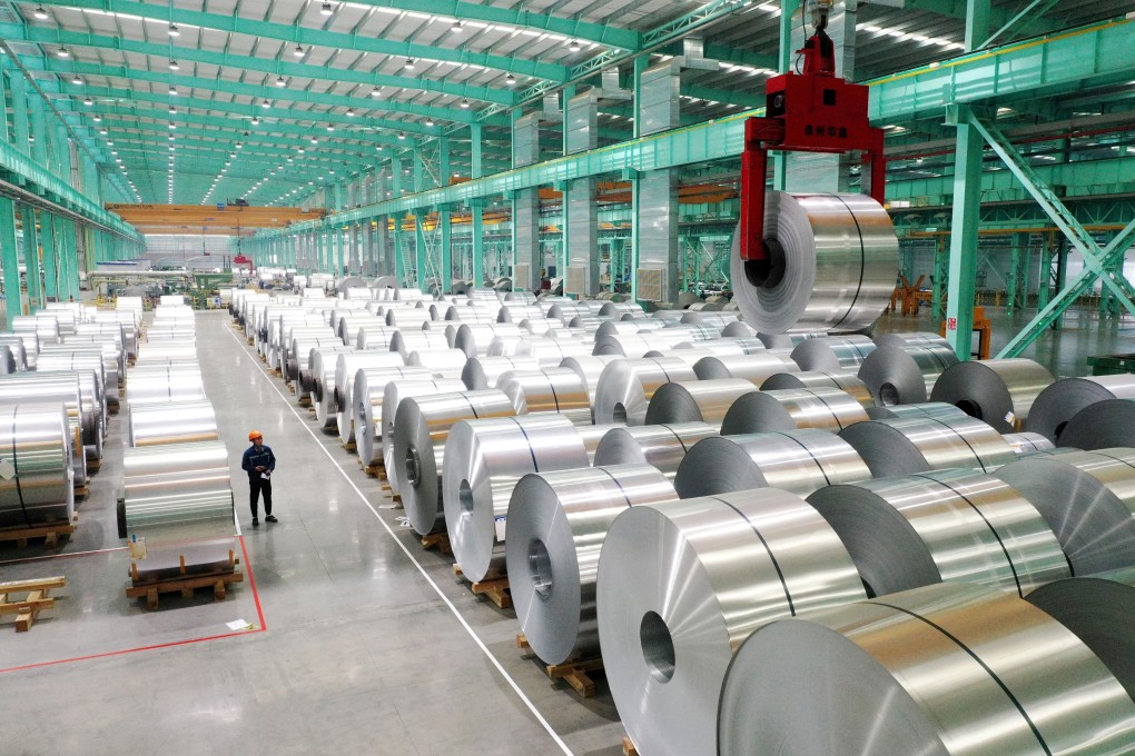 A drone view shows an employee working on the production line of aluminium products at a factory in Huaibei, Anhui province, China, in February 2025. Photo: Reuters