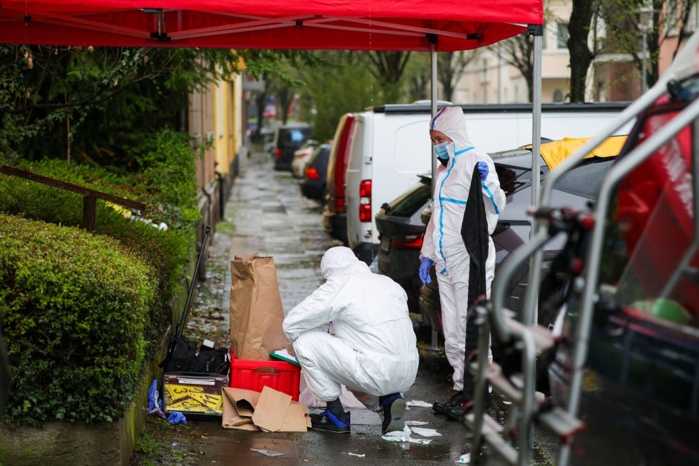 Forensic investigators secure evidence following a knife attack in Witten, western Germany on Sunday. Photo: dpa