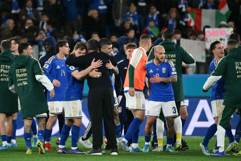 Italy head coach Gennaro Gattuso (black tracksuit) celebrates with players after winning their European qualification semi-final against Northern Ireland in Bergamo last Thursday. Photo: AFP