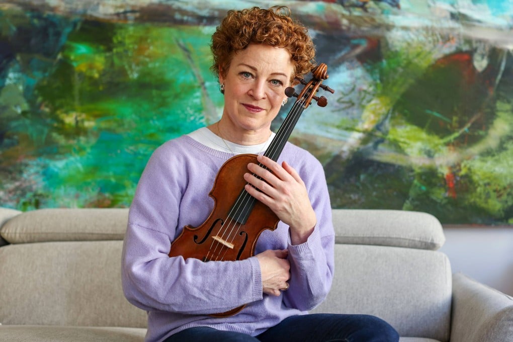 Musician Carolin Widmann had to cradle her violin like a baby on a Lufthansa flight. She wrote to the company’s CEO and the rules were changed. Photo: Jan Woitas/dpa