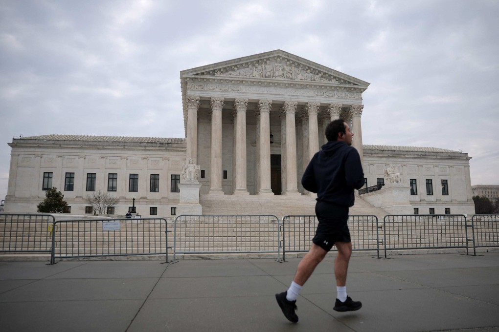 A person jogs in front of the US Supreme Court in Washington, DC. An 8-1 High Court majority sided with a Christian counsellor who argues the law banning talk therapy violates the First Amendment. Photo: Getty Images via AP