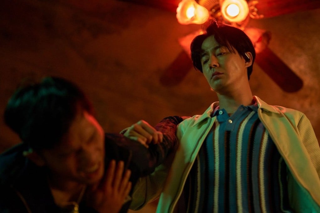 Zo In-sung (right) in a still from Humint, a Korean spy movie from director Ryoo Seung-wan that is now streaming on Netflix.