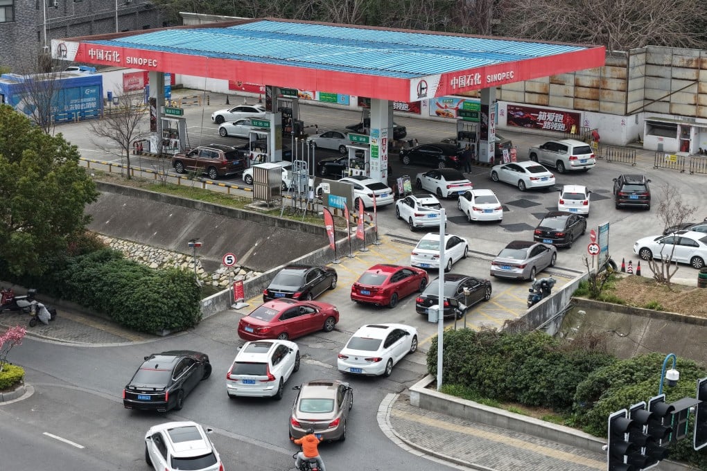 Drivers line up to refuel at a petrol station in China’s Jiangsu province last week, amid concerns about rising energy prices due to the ongoing Middle East conflict. Photo: EPA