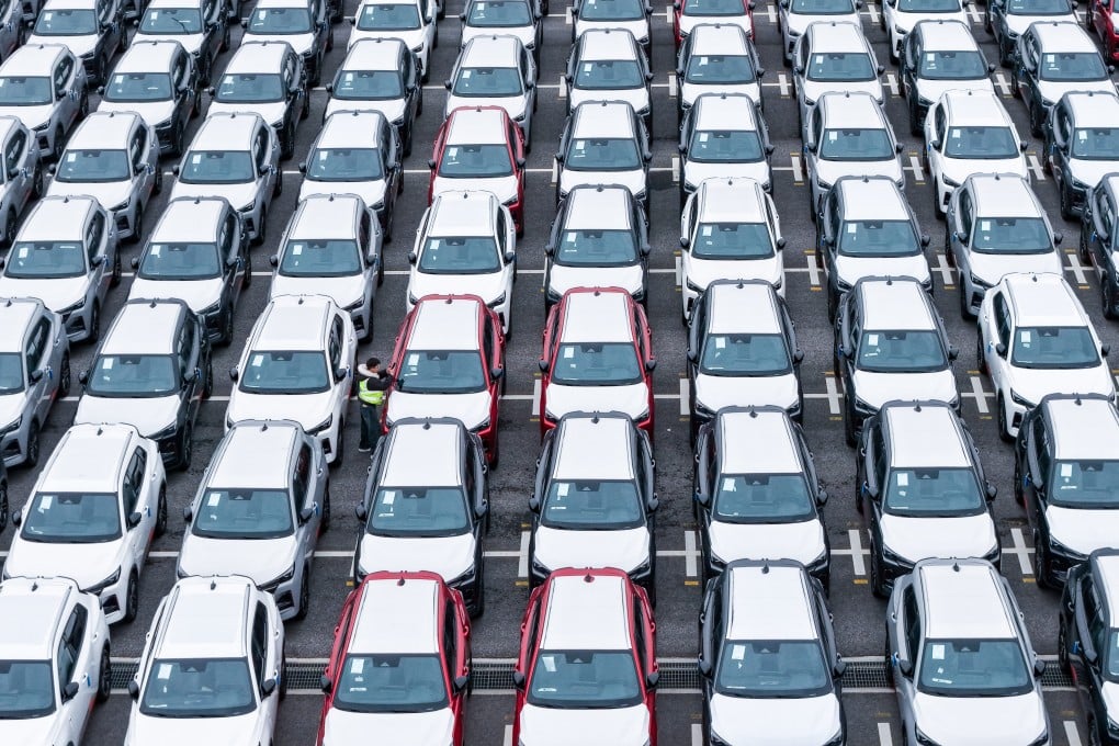 Large numbers of cars are lined up ready for export at a port in eastern China’s Jiangsu province. China recently overtook Japan as the world’s largest car exporter. Photo: Xinhua