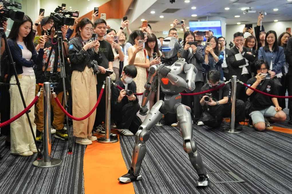 An EngineAI robot performs a demonstration for the media at the Convention and Exhibition Centre in Wan Chai. Photo: Elson Li