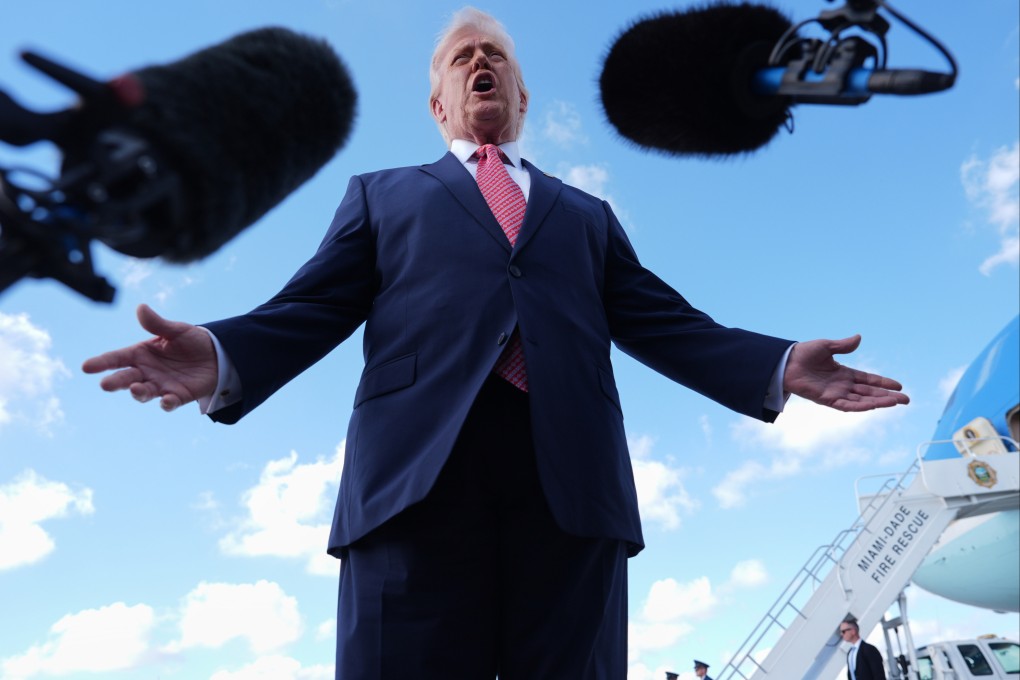 President Donald Trump speaks to reporters after stepping off Air Force One on Friday at Miami International Airport. Trump has been under growing pressure to end the war as oil prices have skyrocketed. Photo: AP