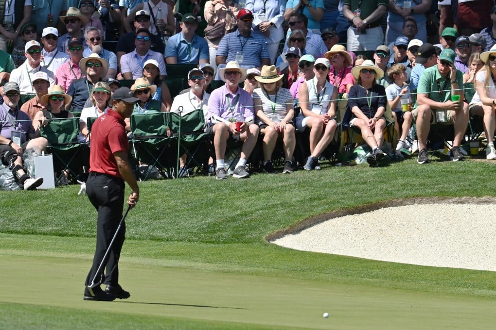 Tiger Woods lines up a putt on the 10th green during the final round of the Masters in 2024, the last time the 15-time major winner appeared at the tournament. Photo: TNS