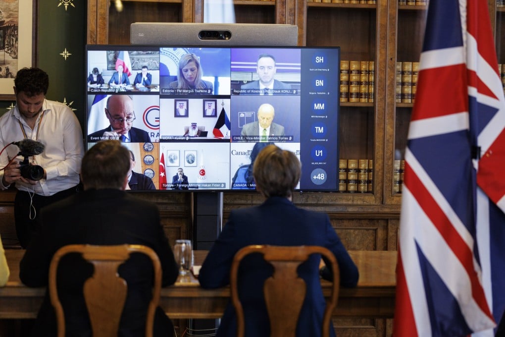 British Foreign Secretary Yvette Cooper (right) gives her opening remarks as she hosts a virtual meeting with the foreign ministers of the signatory countries on securing the Strait of Hormuz in London on Thursday. Photo: EPA