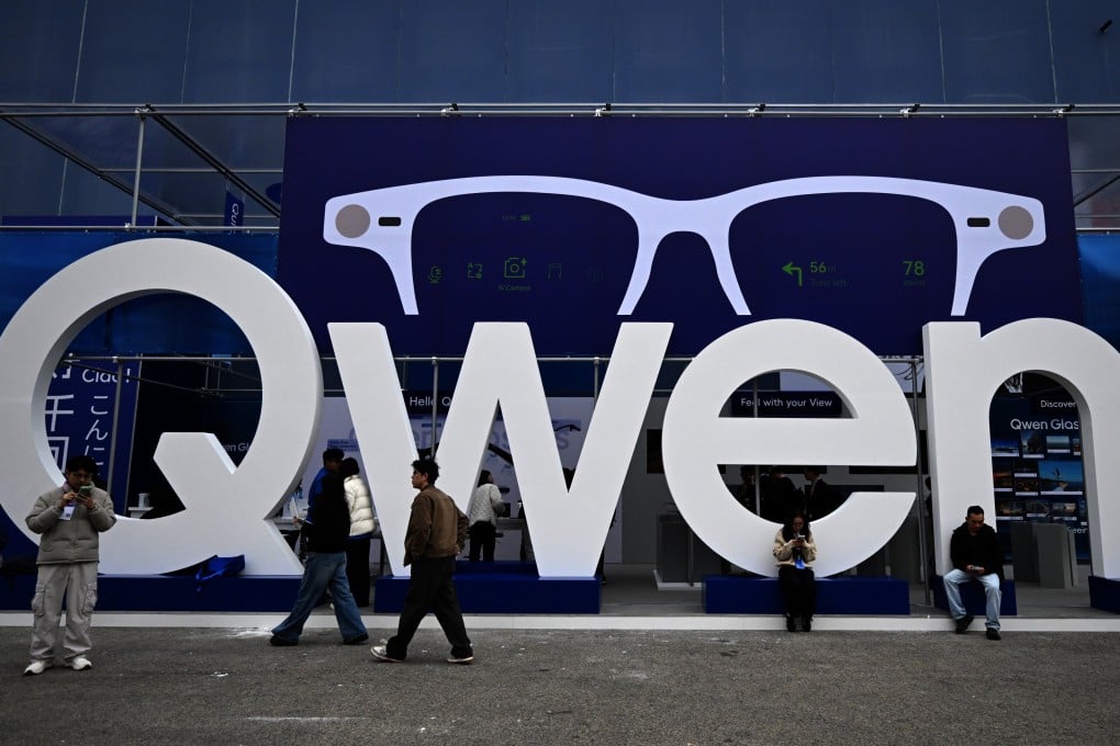 People walk past the Alibaba Qwen booth at the Mobile World Congress in Barcelona, Spain, March 2, 2026. Photo: Xinhua