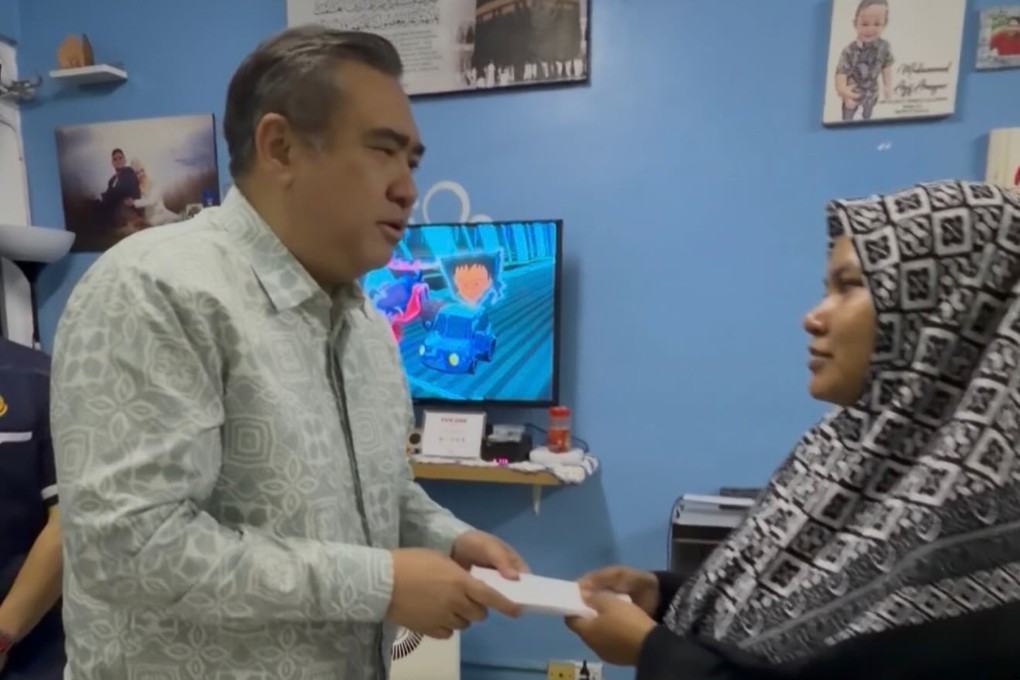 Malaysia’s Transport Minister Anthony Loke offers condolences and personal financial aid to the family of Amirul Hafiz Omar, who was killed in a drink-driving accident. Photo: Handout