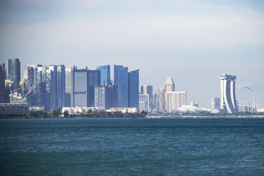Singapore’s skyline. A former teacher faces nine charges in the city state for sexual acts with a minor. Photo: Xinhua