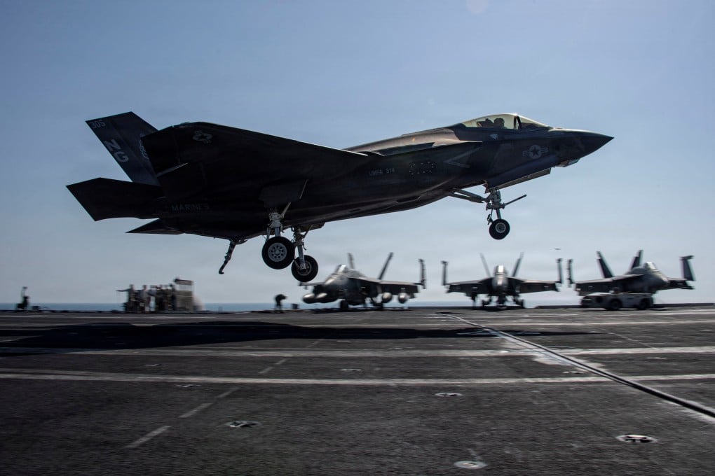 A US F-35C Lightning II landing on the USS Abraham Lincoln on March 7. Photo: US Navy via Reuters
