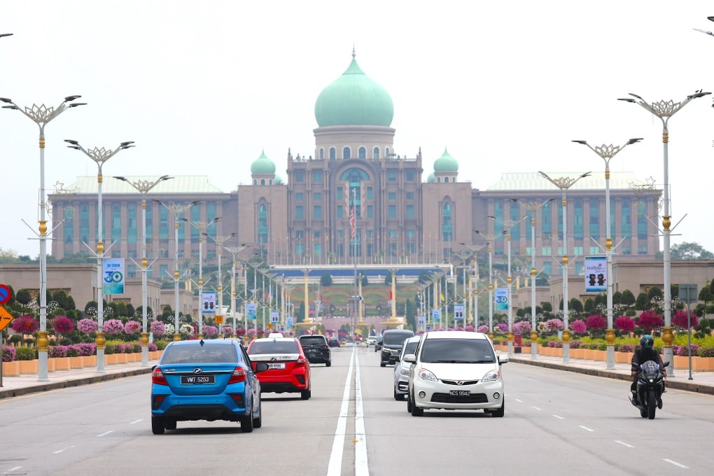 Vehicles are seen near the Prime Minister’s Office in Putrajaya, outside Kuala Lumpur, Malaysia, on March 27. Photo: EPA