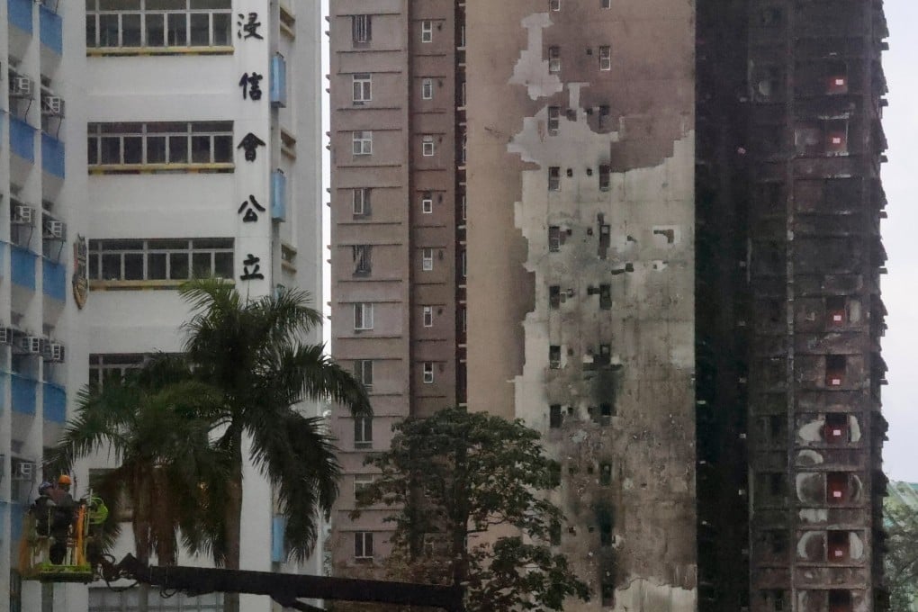 The damaged buildings of Wang Fuk Court (right) in Tai Po are seen on March 27. The Competition Commission has launched proceedings targeting alleged corruption and anti-competitive practices in the bids for several projects, including one linked to the Wang Fuk Court inferno. Photo: Jonathan Wong