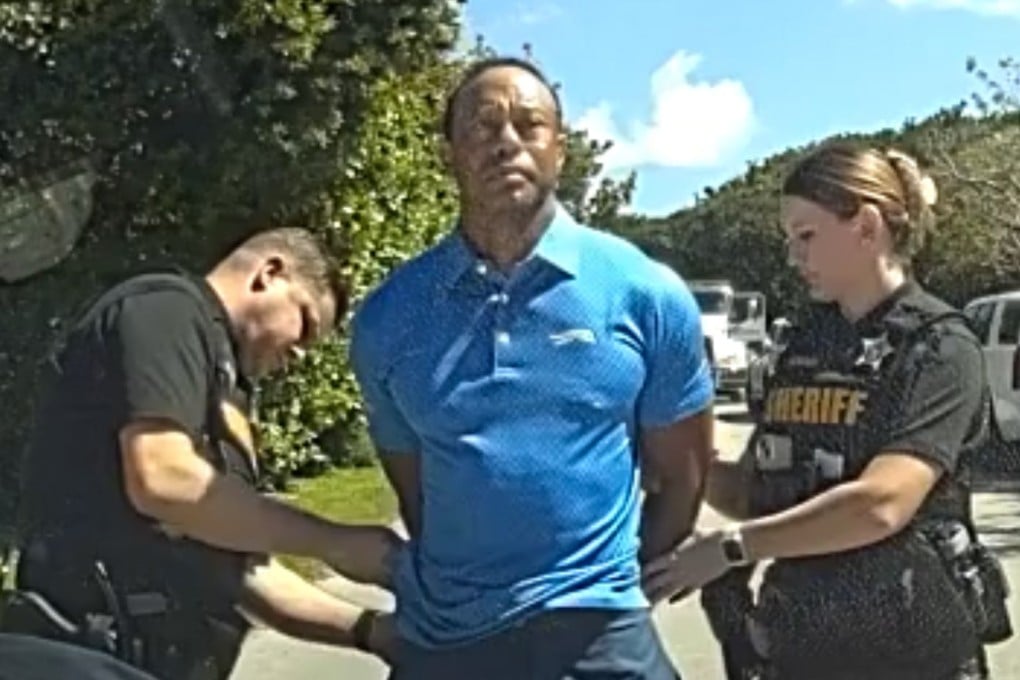 Tiger Woods is taken into custody by sheriff’s deputies following a car crash in Jupiter Island, Florida, in March. Photo: Martin County Sheriff’s Office via AP