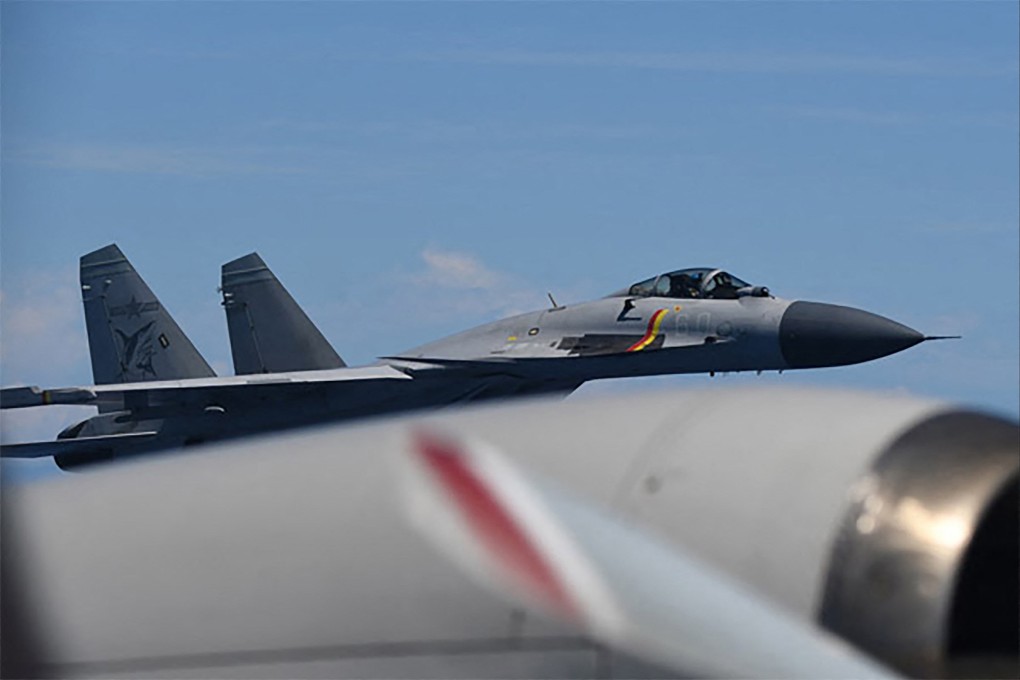 A J-15 fighter jet from the Chinese aircraft carrier Shandong making an unusual approach to a Japan Maritime Self-Defence Force P-3C patrol aircraft conducting surveillance above the Pacific Ocean on June 8, 2025. Photo: Handout /Japan’s Ministry of Defence / AFP