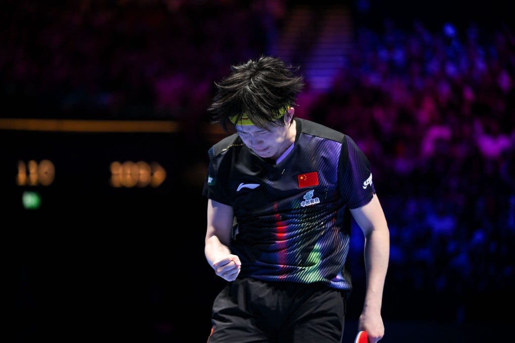 Wang Chuqin celebrates dbeating Felix Lebrun at the ITTF World Cup in Macau. Photo: Xinhua