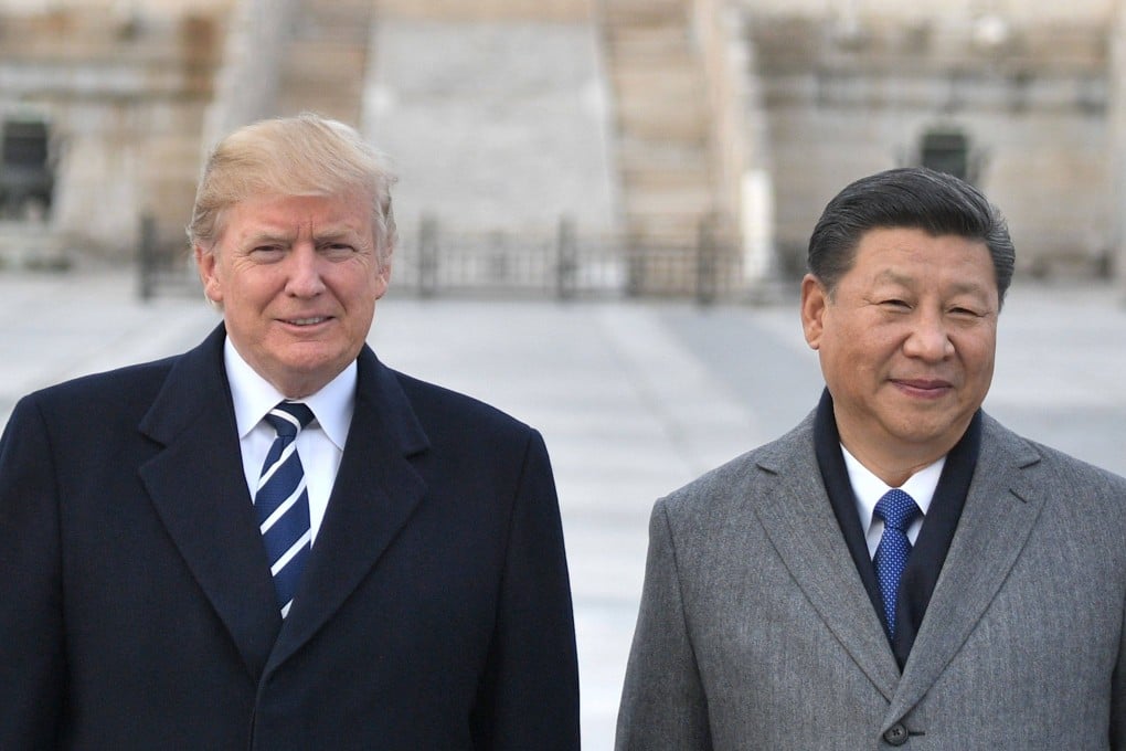 US President Donald Trump, left, and President Xi Jinping pose for a photo at the Forbidden City in Beijing on November 8, 2017. Photo: AFP