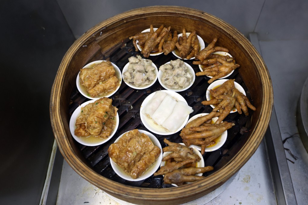 A large bamboo basket filled with different types of dim sum. Photo: Nora Tam