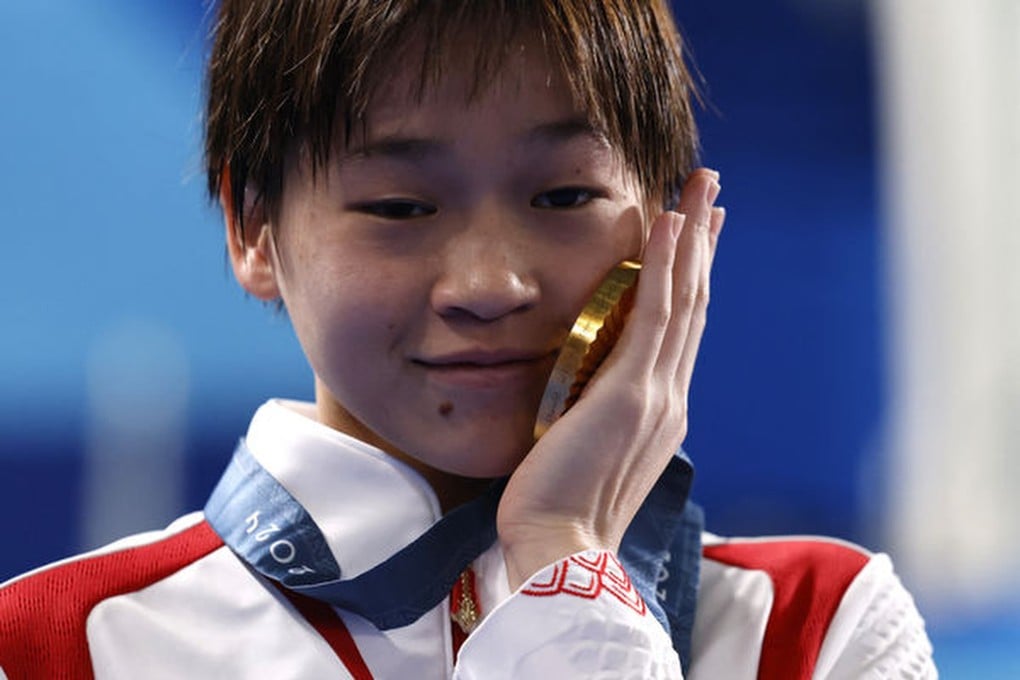Quan Hongchan celebrates winning gold in the women’s 10m platform at the Paris Olympics on August 6, 2024. Photo: Reuters