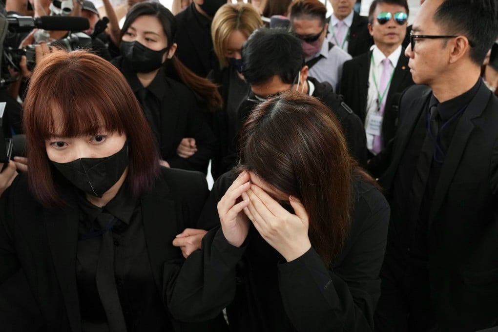 Witnesses from ISS EastPoint Properties leave the City Gallery in Central following the morning session of the Wang Fuk Court fire hearing on April 1. Photo: Karma Lo