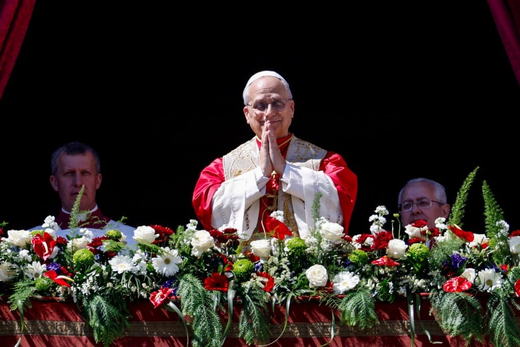 Pope Leo XIV gestures from the main balcony of St. Peter’s Basilica after delivering his ‘Urbi et Orbi’ (To the city and the world) message, on Sunday. Photo: Reuters