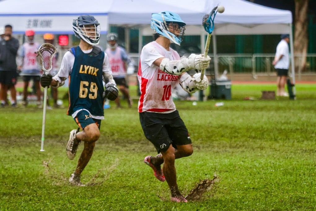 Hong Kong’s Tong Yat-yu (right) takes the ball during his side’s under-16 boys clash with Shanghai Lynx. Photo: Jonathan Wong