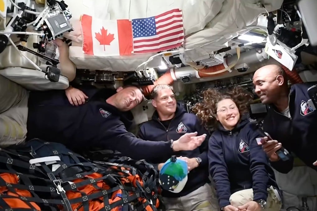 Artemis II astronauts (from left) Reid Wiseman, Jeremy Hansen, Christina Koch and Victor Glover gather for an interview en route to the moon on Saturday. Photo: Nasa via AP