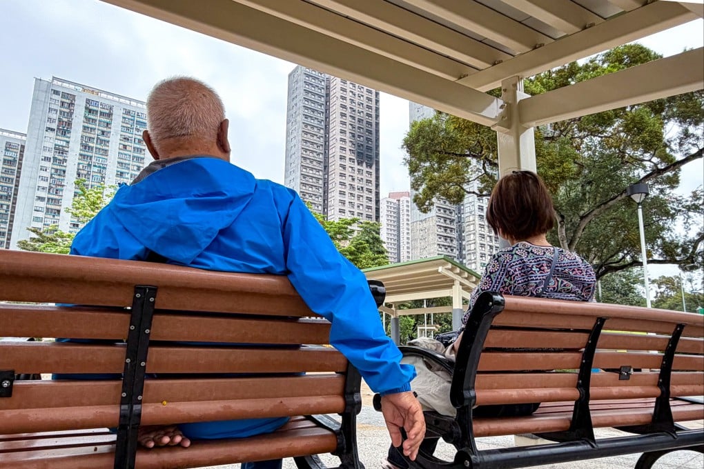 Mr Yau and Mrs Yau, residents of Wang Chi House at Wang Fuk Court in Tai Po, returned to the estate to mourn their lost neighbours. Photo: Denise Tsang