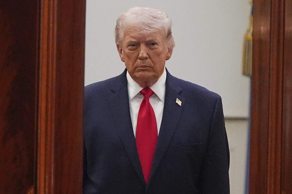 US President Donald Trump arrives in the Cross Hall of the White House on Wednesday before speaking on the Iran war. Photo: AP