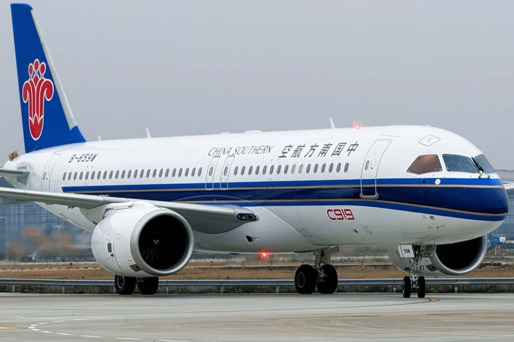A domestically-produced C919 lands at Guangzhou Baiyun International Airport. Photo: Handout