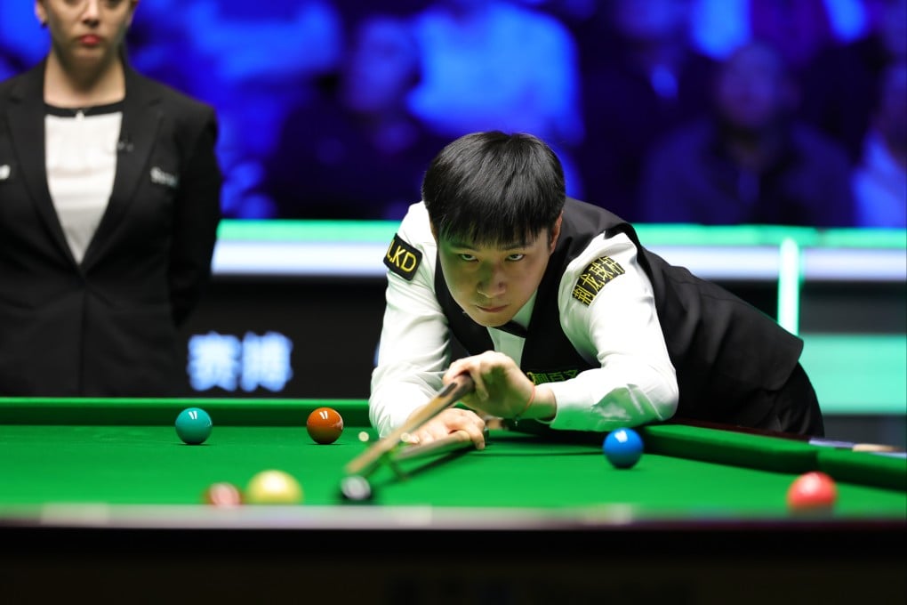 Zhao Xintong of China beat world No 1 Judd Trump of England to win the Tour Championship in Manchester on Sunday. Photo: Xinhua