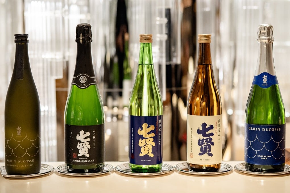 The wide selection of sakes available from Shichiken, a brewery in Daigahara, Hokuto city, in Japan’s Yamanashi prefecture, includes sparkling sake collaborations with French chef Alain Ducasse (pictured on the left and right). Photo: Shichiken