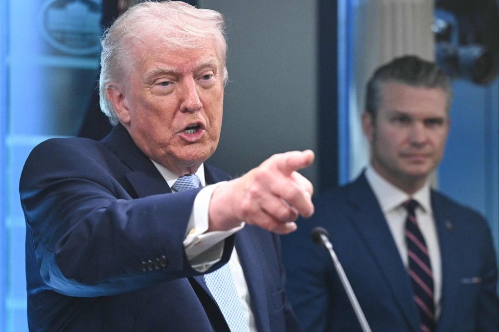 US President Donald Trump, alongside Secretary of Defence Pete Hegseth, speaks about the conflict in Iran at the White House in Washington on Sunday. Photo: AFP