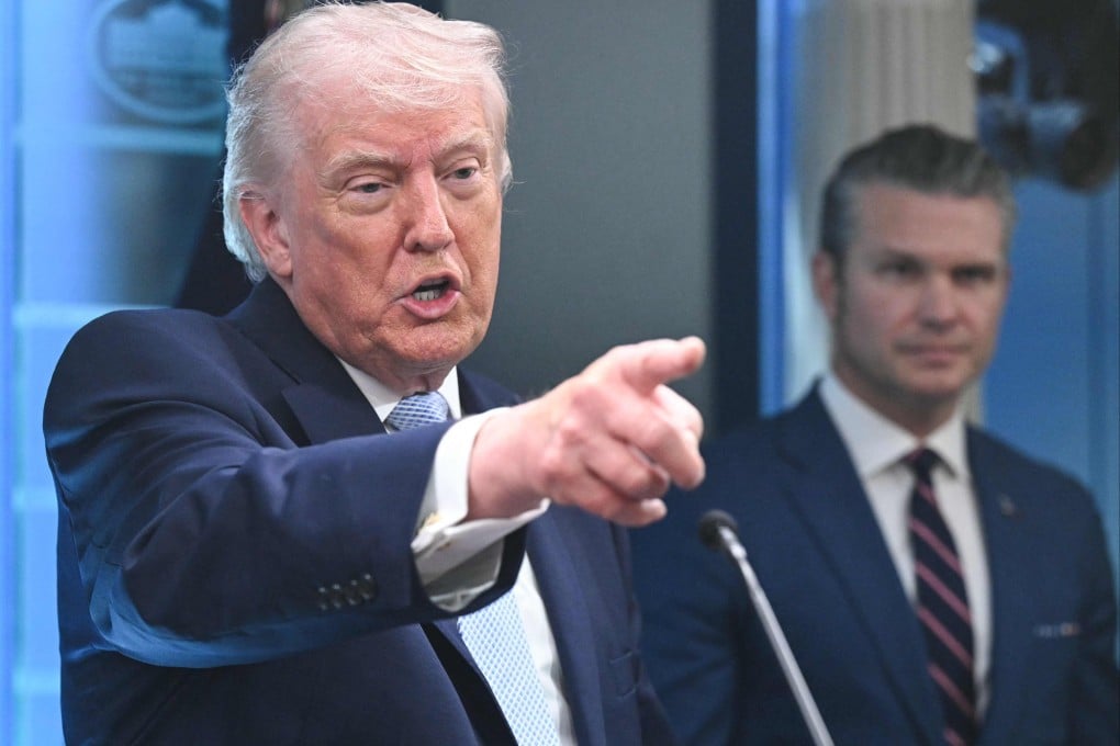 US President Donald Trump, alongside Secretary of Defence Pete Hegseth, speaks about the conflict in Iran at the White House in Washington on Sunday. Photo: AFP