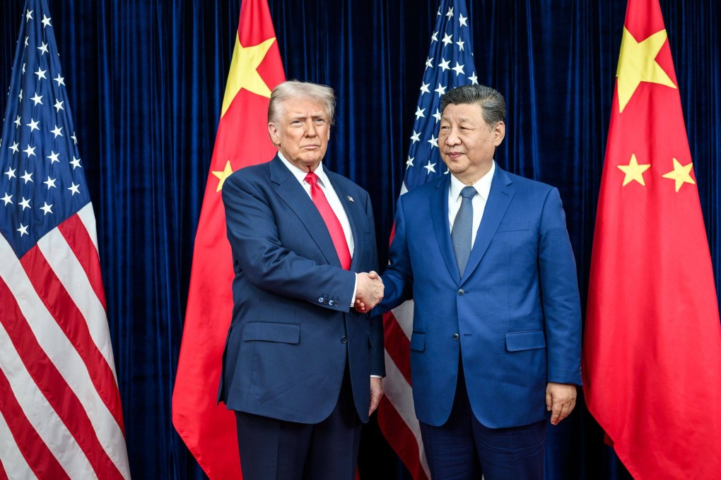 US President Donald Trump greets Chinese President Xi Jinping before a bilateral meeting at the Gimhae International Airport terminal in South Korea in October. Photo: Daniel Torok/White House/dpa