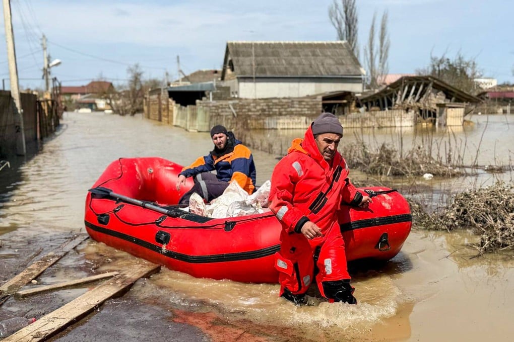First responders carry out a search and rescue operation on Monday in the flood-hit village of Kala in Russia’s Derbent district, following heavy rains. Photo: TASS via Zuma Press / dpa