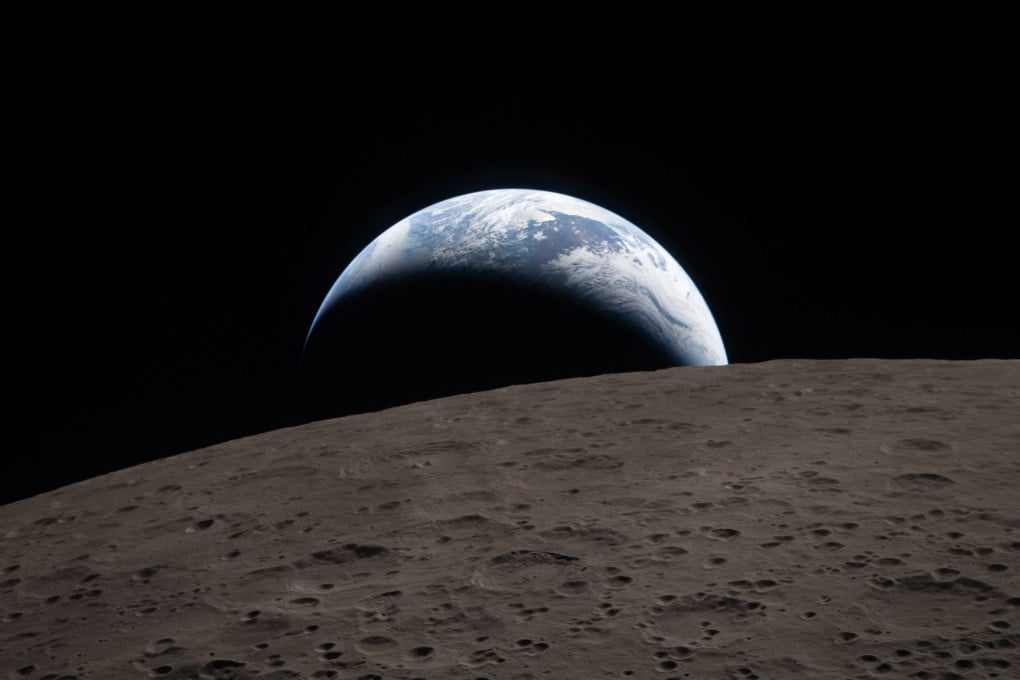 The Moon and Earth seen from the Orion spacecraft on Monday. Photo: Nasa/Xinhua