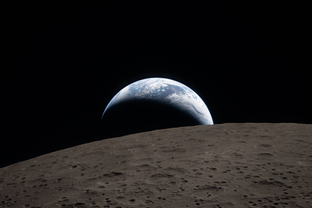 Artemis II’s Earthset photo was reminiscent of Apollo 8’s Earthrise shot from 1968. Photo: Nasa via dpa