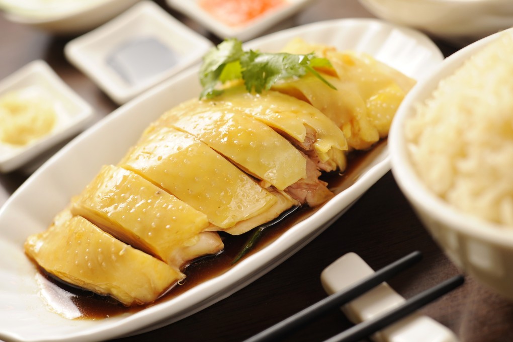 Hainanese chicken rice at a restaurant in Hong Kong. From humble origins on the Chinese island of Hainan, the dish spread across Asia, evolving into much-loved local variations from Singapore to Vietnam. Photo: Warton Li