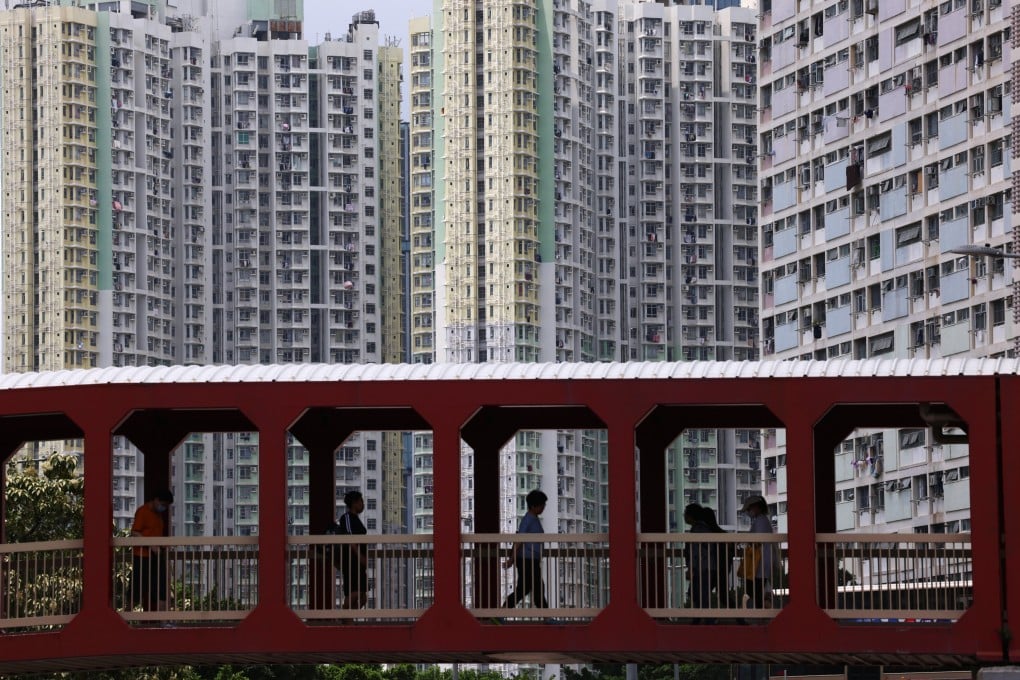 People walk across a bridge, with Kai Ching Estate and Choi Hung Estate in the background, in 2025. A public health approach ought to be taken to mental health crisis intervention by integrating police with academia and NGOs. Photo: Jelly Tse