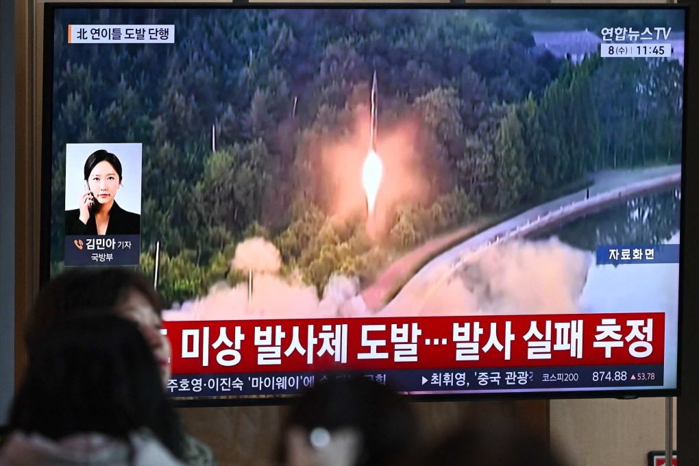 People watch a news broadcast with file footage of a North Korean missile test at a train station in Seoul on Wednesday. Photo: AFP