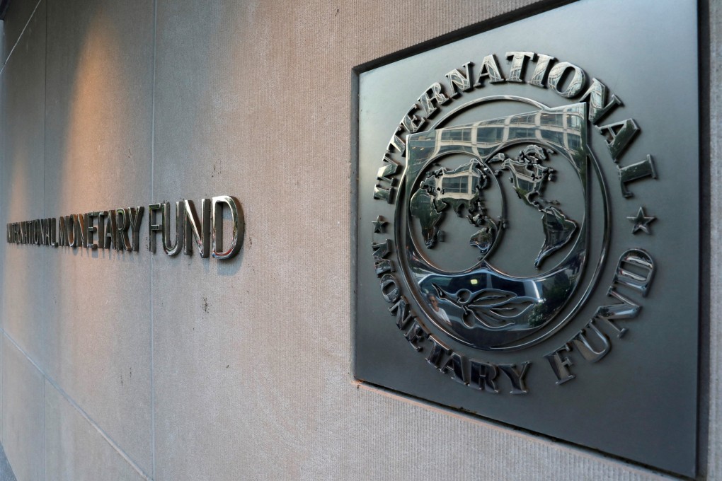 The International Monetary Fund logo is seen outside its headquarters in Washington. Photo: Reuters