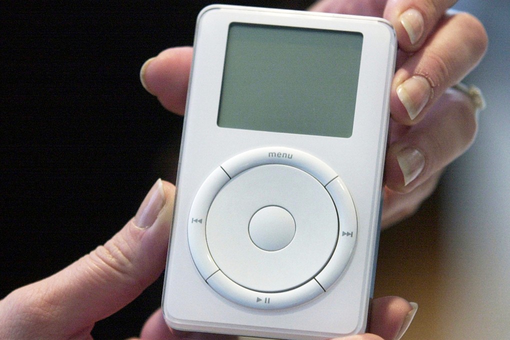 Then-Apple CEO Steve Jobs holds a first-generation iPod during a news conference in October 2001, at Apple’s headquarters in Cupertino, California. Apple’s music players are gaining popularity again, despite the tech giant stopping selling them years ago. Photo: AP