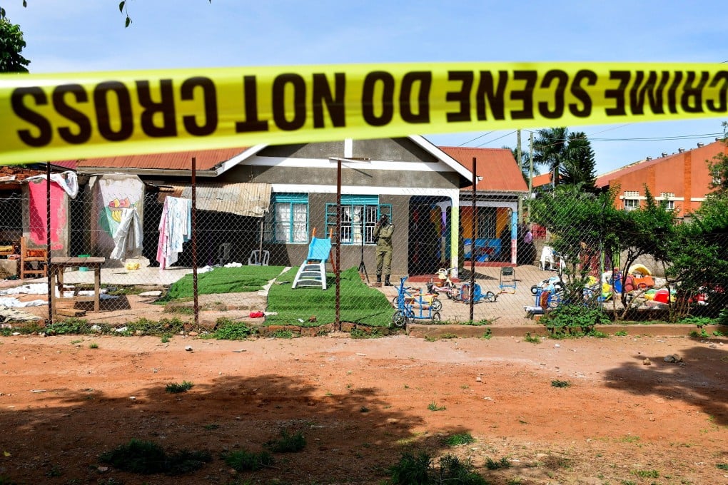 Police tape is seen at the scene of a stabbing attack at a kindergarten in Kampala, Uganda, on April 2. Photo: Reuters