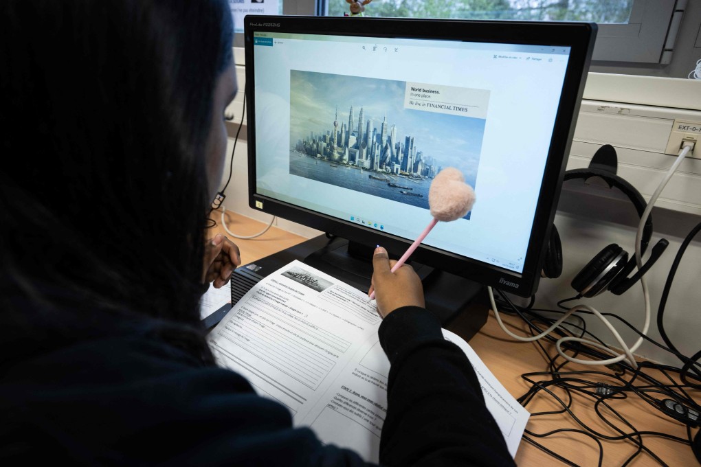 A student does an exercise during an AI class at the College Jean Mace in Mulhouse, France, on March 26. AI is seen as a revolution in thinking and learning. Photo: AFP