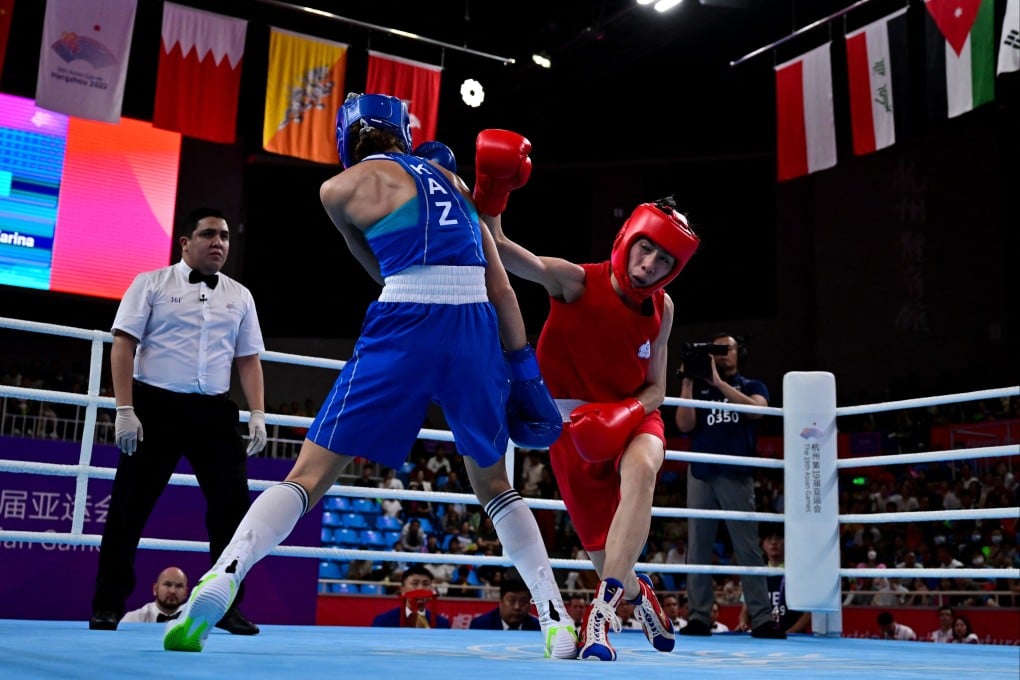 Chinese Taipei’s Lin Yu-ting (right) beat  Kazakhstan’s Karina Ibragimova in the women’s 57kg final boxing bout during the 2022 Asian Games in Hangzhou. Photo: AFP