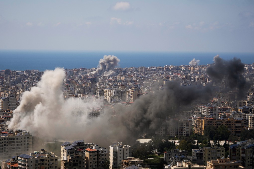 Smoke rises over Beirut, Lebanon, on Wednesday  after several Israeli air strikes. Photo: AP
