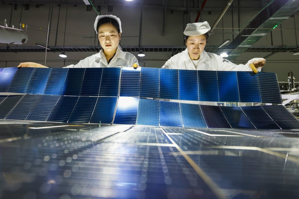 Employees work on the production line of solar panels at a workshop of Jiangsu DMEGC New Energy on February 25, 2026, in Sihong county, Suqian city, in China’s Jiangsu province. Photo: VCG via Getty Images
